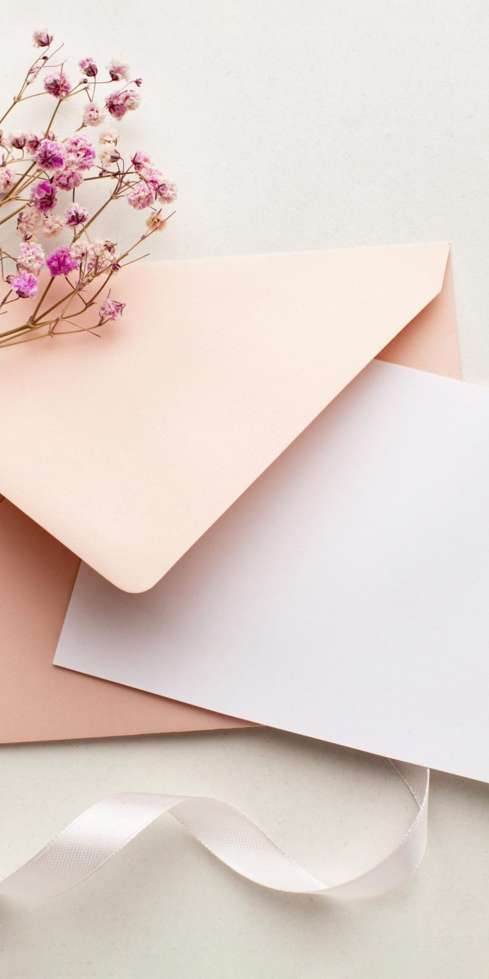 pink-flowers-envelope-save-date-wedding-concept